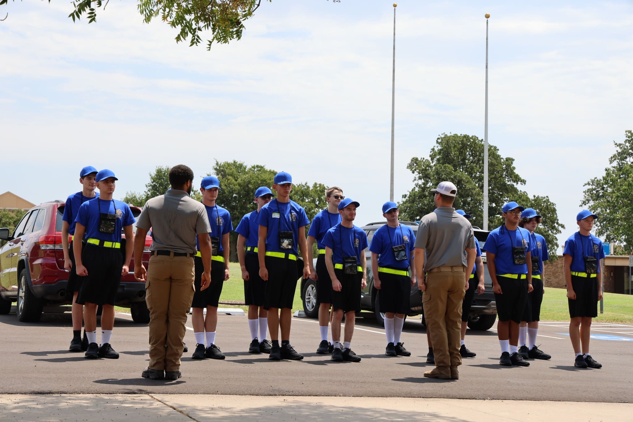 534126946_122185509494588319_3281505146327571386_n (1) A platoon of Associates assembles in front of Residential Advisors in formation.
